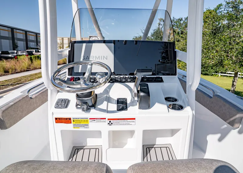 Slide: The Image of Helm console of Sea Hunt Ultra 229 boat, model year 2026. - 14