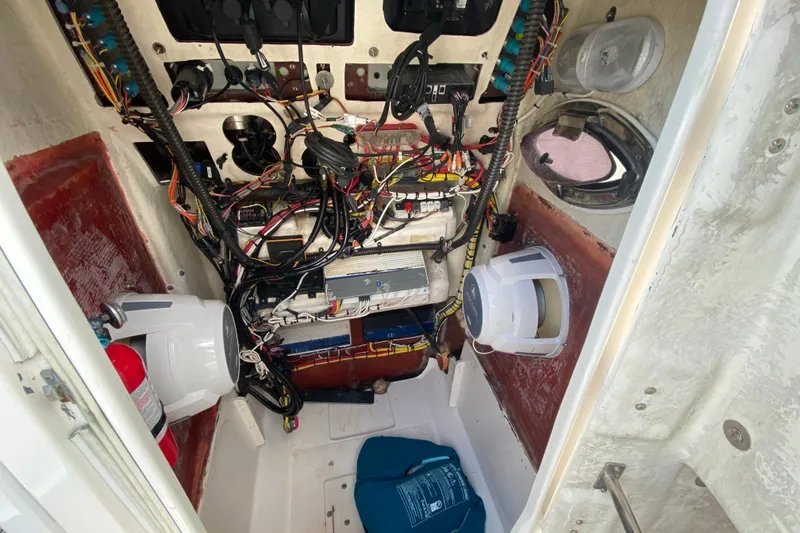 Slide: The Image of Interior wiring and components of a 2022 Robalo R242 Center Console boat. - 42