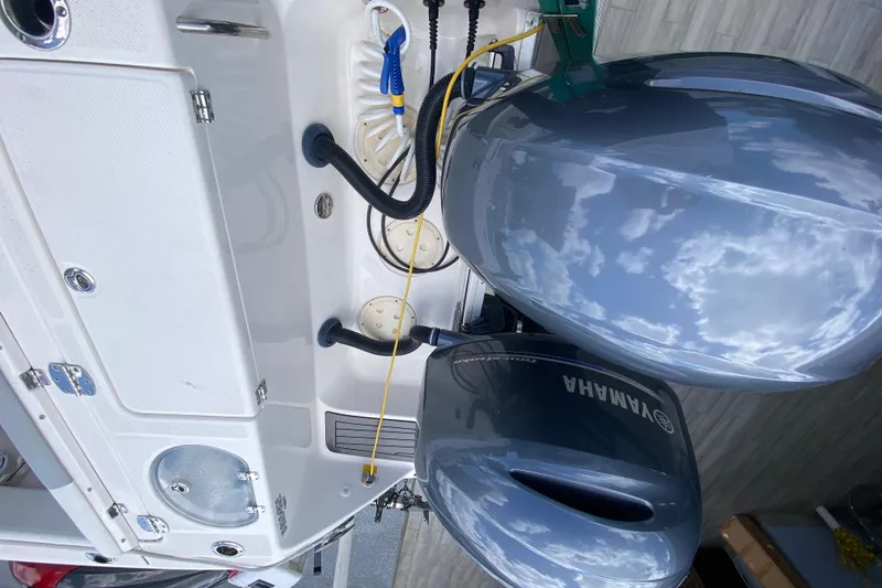 Slide: The Image of 2022 Robalo R242 Center Console with Yamaha outboard engines, detailed view. - 47