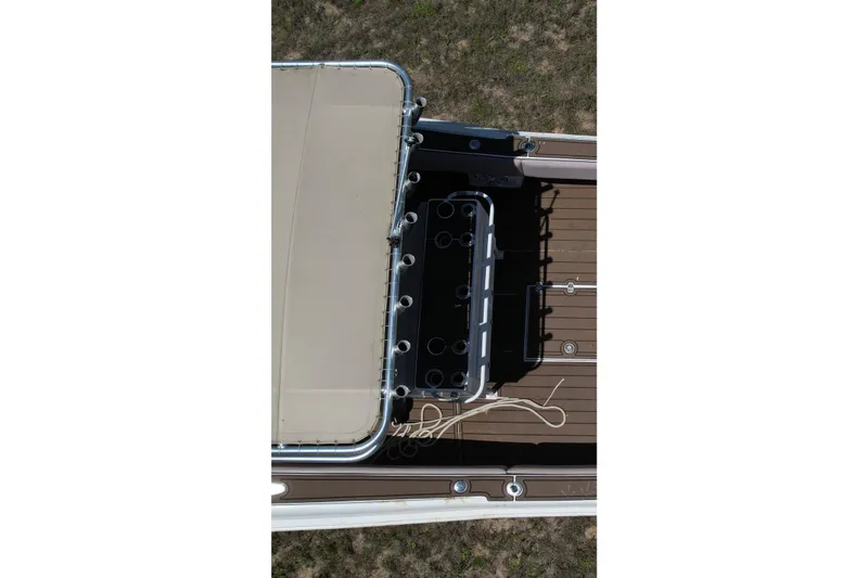 Slide: The Image of Overhead view of 2007 Dusky 33 Open Fisherman boat deck with rod holders. - 7