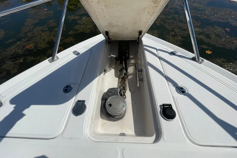 Slide: The Image of Bow anchor compartment of 2006 Regal Commodore 3560 IB boat, open and exposed. - 25