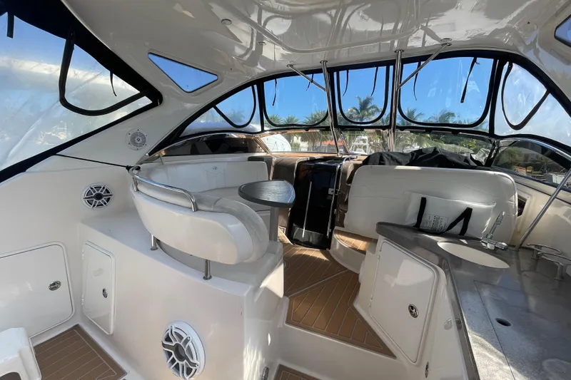 Slide: The Image of Interior of 2006 Regal Commodore 3560 IB yacht with seating and table. - 29
