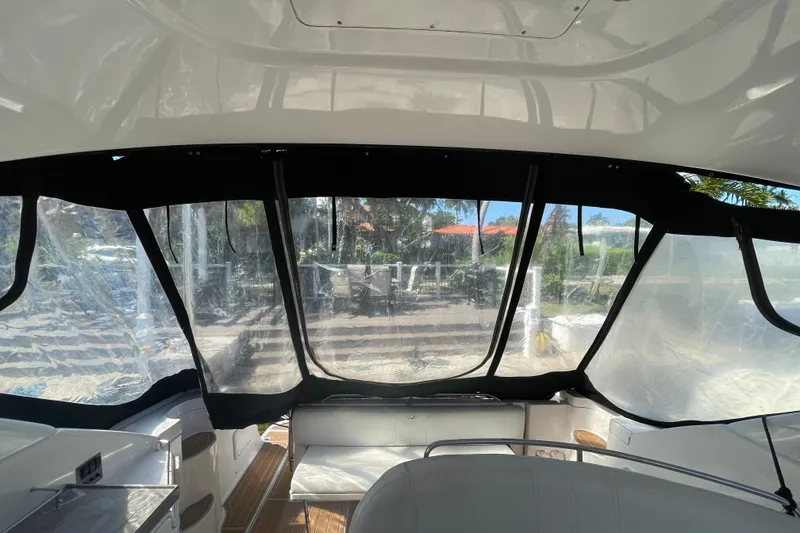 Slide: The Image of Interior view of 2006 Regal Commodore 3560 IB yacht with clear canopy windows. - 37