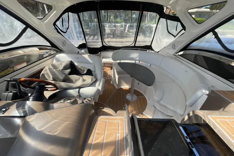 Slide: The Image of Interior of a 2006 Regal Commodore 3560 IB yacht with seating and helm. - 39