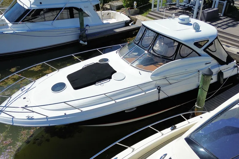 Slide: The Image of 2006 Regal Commodore 3560 IB yacht docked at marina, aerial view. - 4