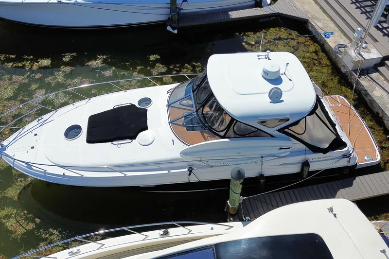 Slide: The Image of 2006 Regal Commodore 3560 IB yacht docked at marina, aerial view. - 8