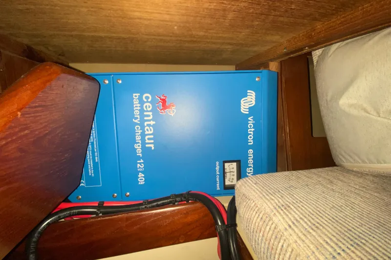 Slide: The Image of Blue Victron Energy Centaur battery charger installed in a 1995 Hunter 33.5 boat. - 44