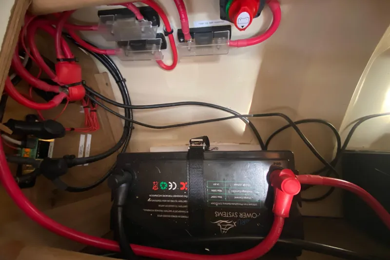 Slide: The Image of Electrical system of a 1995 Hunter 33.5 boat with battery and wiring. - 48