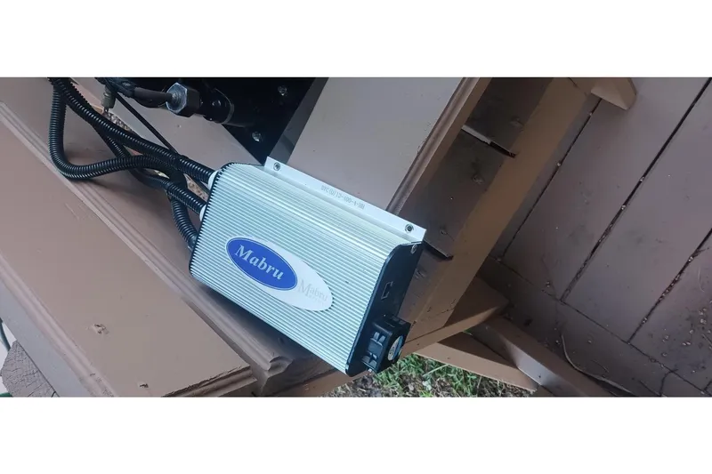 Slide: The Image of Power inverter installed on a 1995 Hunter 33.5 boat, connected with cables. - 62