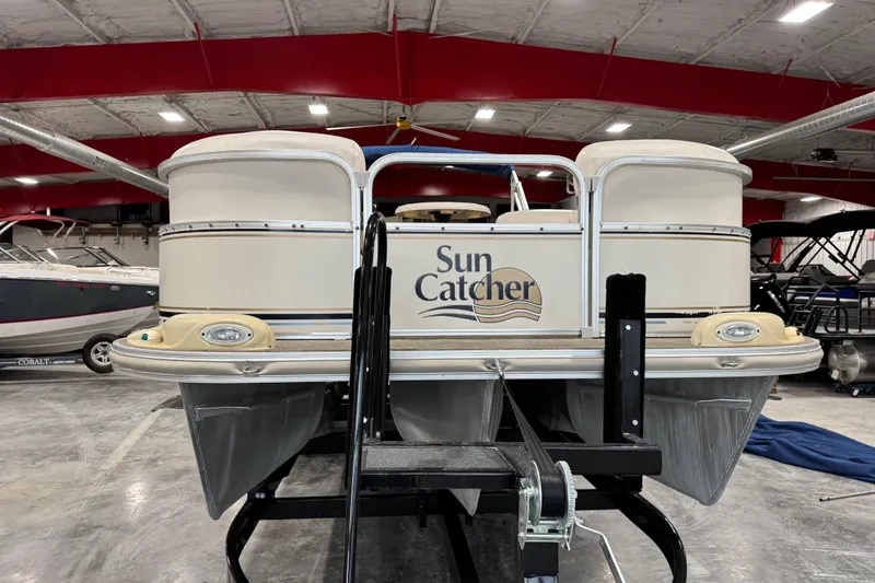 Slide: The Image of 2006 G3 Sun Catcher pontoon boat in indoor storage facility. - 6