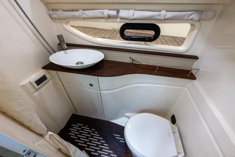 Slide: The Image of Bathroom interior of 2015 Sea Ray Sundancer 350 yacht with modern sink and toilet. - 25