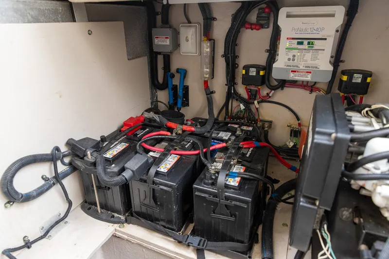 Slide: The Image of Electrical system of a 2015 Sea Ray Sundancer 350 with batteries and wiring. - 28