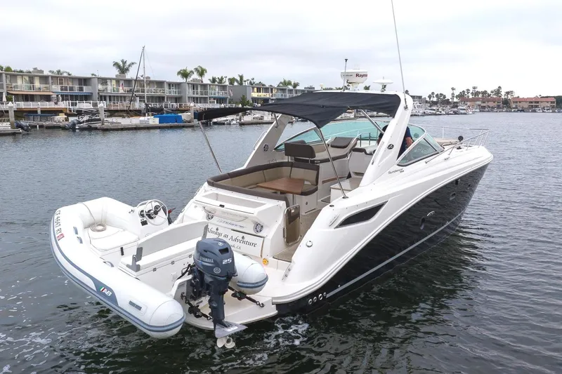 Slide: The Image of 2015 Sea Ray Sundancer 350 yacht docked in harbor. - 3