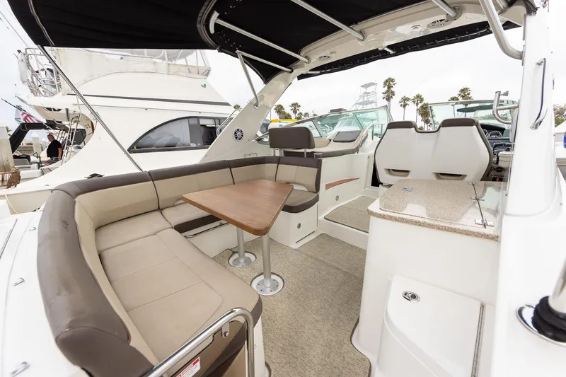 Slide: The Image of Luxurious 2015 Sea Ray Sundancer 350 yacht interior with seating and table. - 7