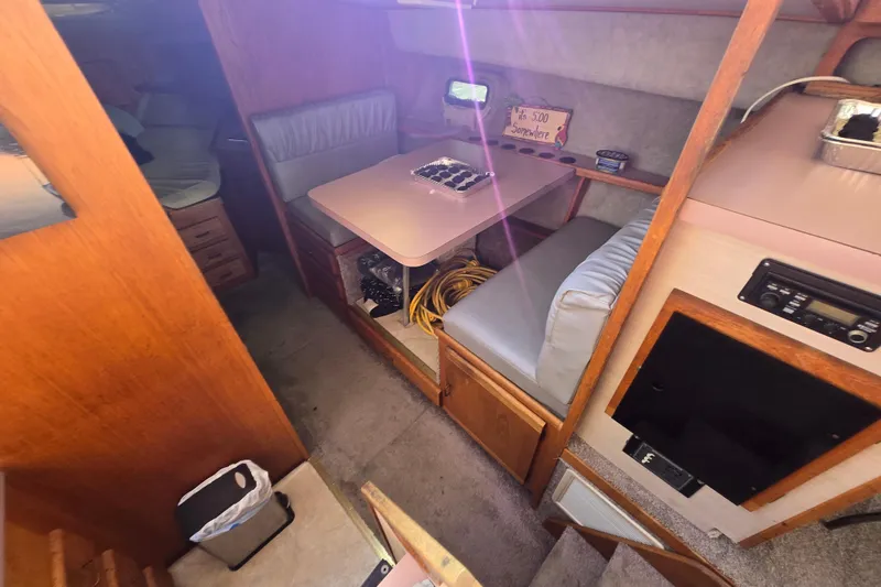 Slide: The Image of Interior of a 1988 Silverton 34 Convertible boat with seating and storage. - 2