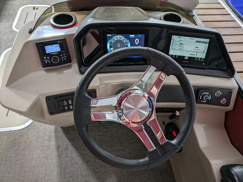 Slide: The Image of Bennington 23 SSR 2027 dashboard featuring modern displays and steering wheel. - 7