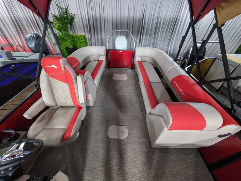 Slide: The Image of Interior of 2027 Bennington 23 SSR with red and beige seating. - 9
