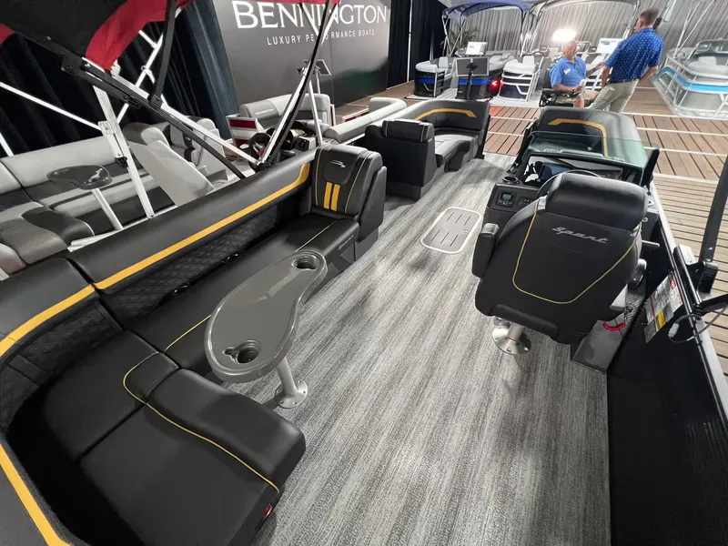 Slide: The Image of Interior of 2027 Bennington 23SL with luxurious seating and modern design. - 10