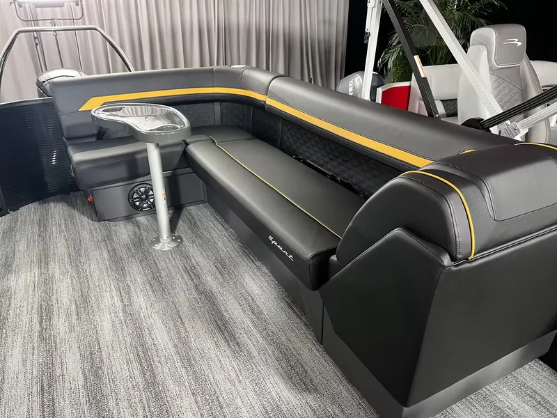 Slide: The Image of Interior of 2027 Bennington 23SL with luxurious black upholstery. - 11