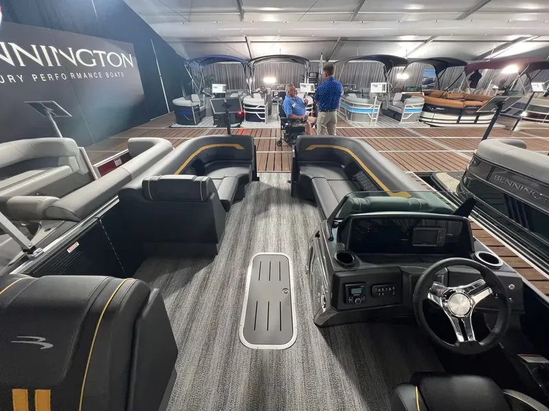 Slide: The Image of Interior of Bennington 23SL 2027 pontoon boat at a show. - 5
