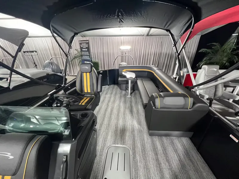 Slide: The Image of Interior of 2027 Bennington 23SL with luxurious seating. - 9