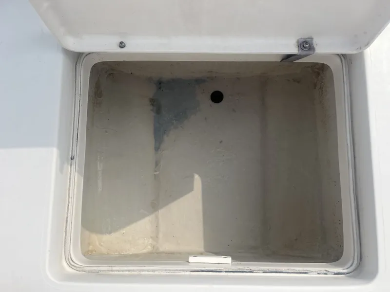 Slide: The Image of Open storage compartment in Pathfinder 2200 Tournament Edition boat. - 12