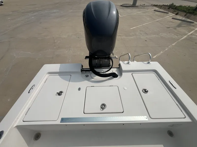 Slide: The Image of 2008 Pathfinder 2200 Tournament Edition boat stern view with motor. - 18