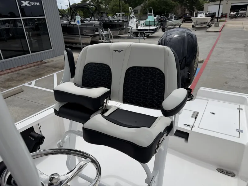 Slide: The Image of 2026 Tidewater 2210 Carolina Bay boat seat outdoors. - 15