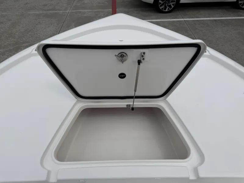 Slide: The Image of Open storage compartment on 2026 Tidewater 2210 Carolina Bay boat. - 24