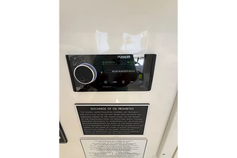 Slide: The Image of Fusion Bluetooth stereo system on 2012 Invincible 42 Open Fisherman boat. - 27