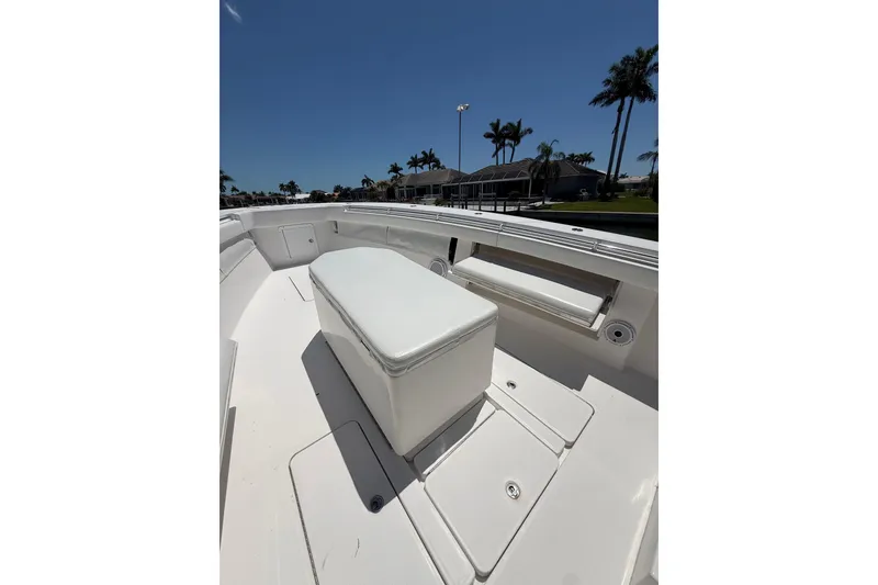 Slide: The Image of 2012 Invincible 42 Open Fisherman boat interior with seating and storage. - 31