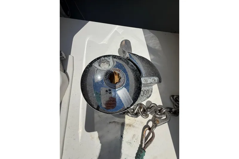 Slide: The Image of Anchor windlass on 2012 Invincible 42 Open Fisherman boat deck. - 33