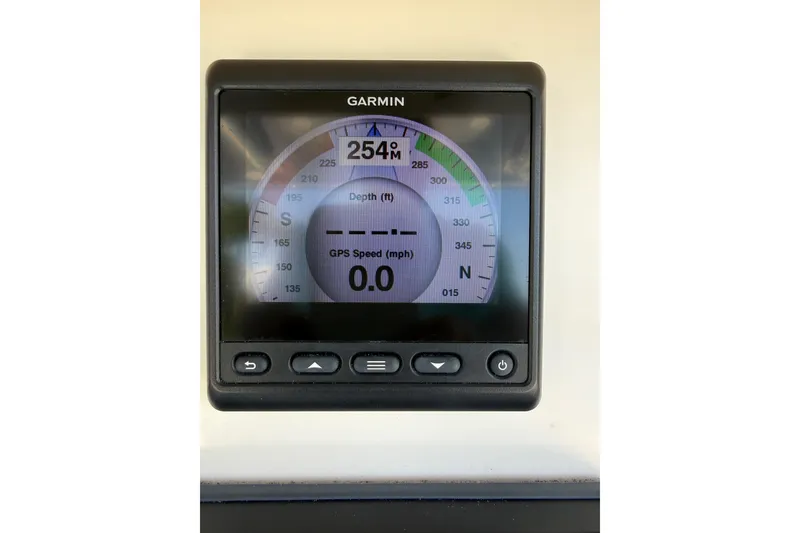 Slide: The Image of Garmin GPS display on 2012 Invincible 42 Open Fisherman, showing speed and depth. - 7
