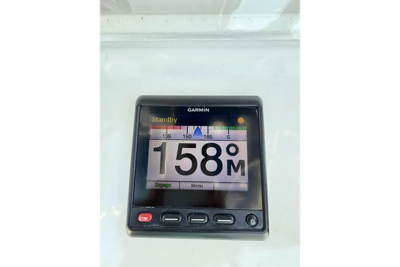 Slide: The Image of Garmin marine display showing 158 degrees on Invincible 42 Open Fisherman, 2012 model. - 8