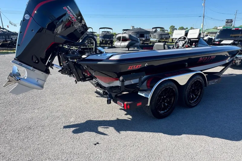 Slide: The Image of 2026 Bullet 21XST boat with Mercury Pro XS engine on a trailer. - 3