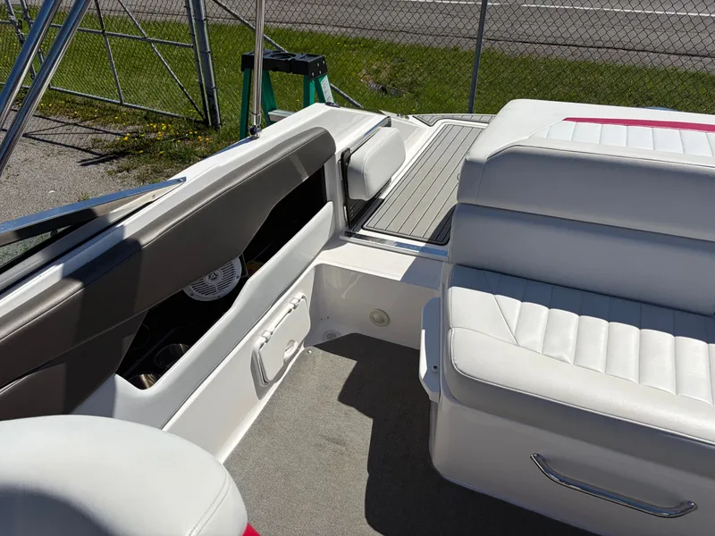 Slide: The Image of Interior of a 2008 Regal 2200 Bowrider with white leather seats. - 14