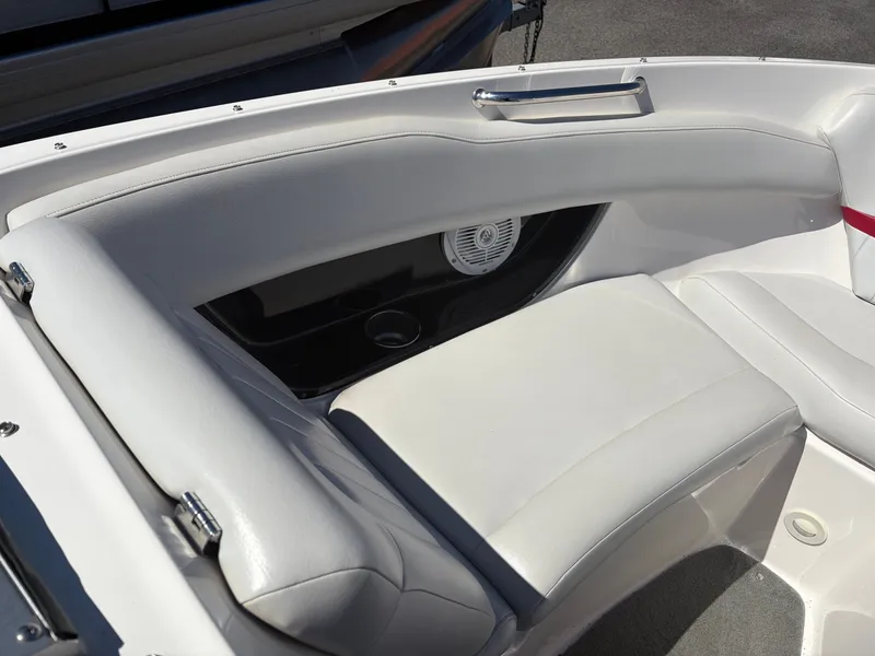 Slide: The Image of Interior of a 2008 Regal 2200 Bowrider with white seating. - 17