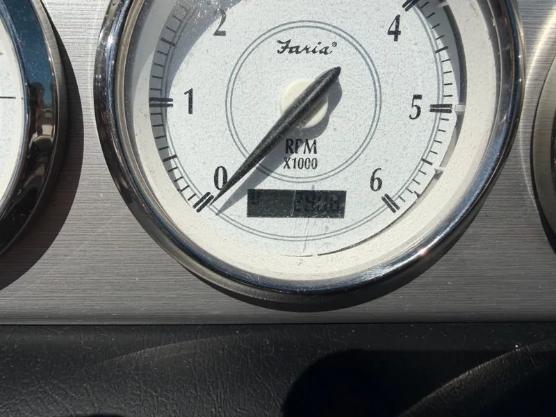 Slide: The Image of Tachometer of a 2008 Regal 2200 Bowrider boat displaying RPM. - 21