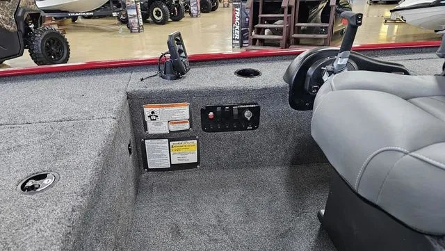 Slide: The Image of Interior of 2026 Tracker Panfish 17 boat with gray seating. - 6