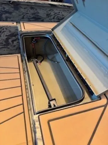 Slide: The Image of Open storage compartment in Grizzly G1650T DB boat, 2026 model. - 15