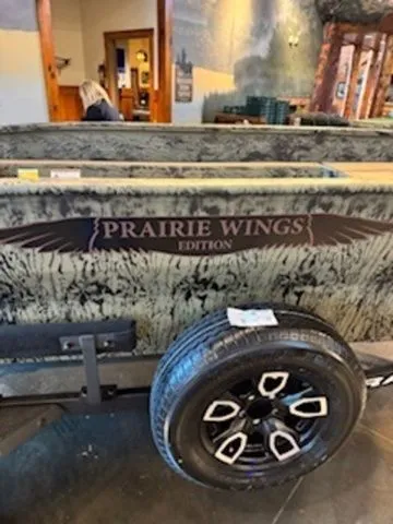 Slide: The Image of Grizzly G1650T DB 2026 Prairie Wings Edition boat with camouflage design. - 18