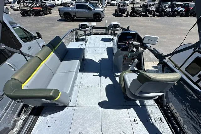 Slide: The Image of Interior view of 2026 Sea-Doo PB SWT FISH boat with seating and helm console. - 12
