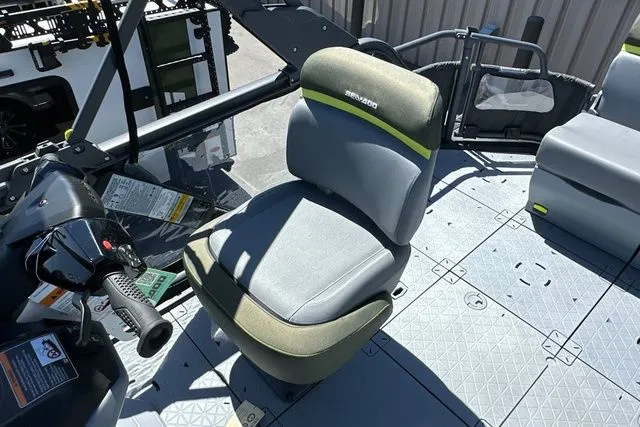 Slide: The Image of 2026 Sea-Doo PB SWT FISH 21 300 GN Aud Gal seating area. - 17