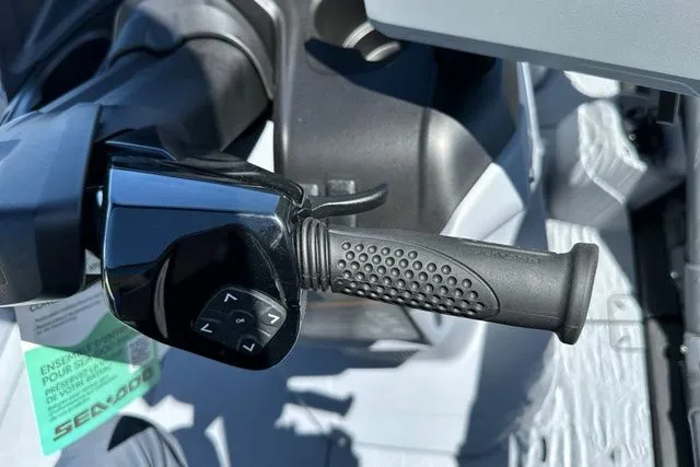 Slide: The Image of Close-up of throttle grip on a 2026 Sea-Doo model. - 8