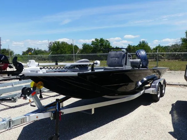 The Image of Black 2026 G3 Bay 21 GX boat on trailer. - 1