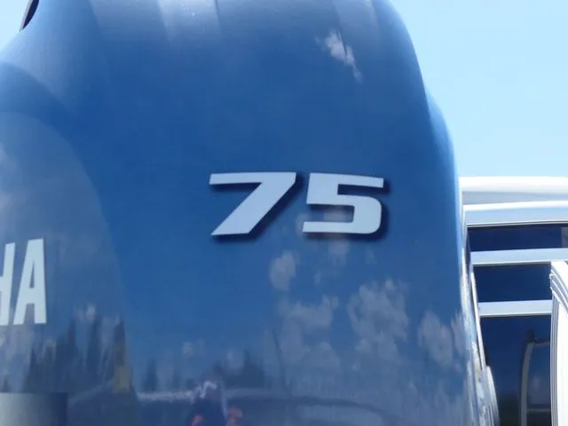 Slide: The Image of Close-up of a Yamaha 75 horsepower outboard motor. - 6