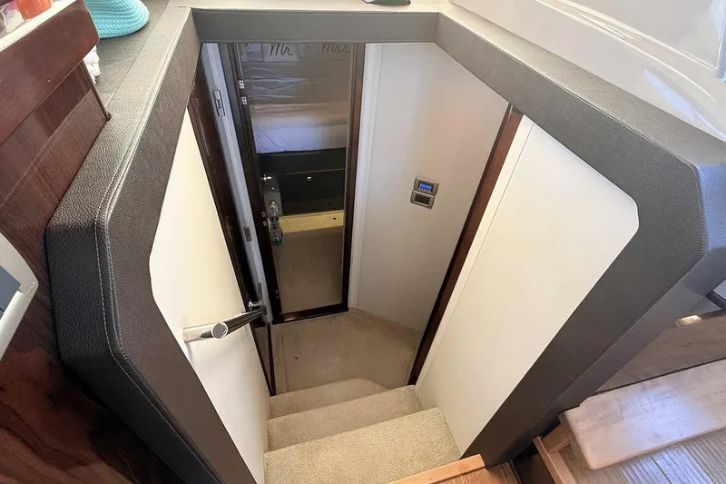 Slide: The Image of Staircase leading to cabin interior of 2017 Sea Ray Sundancer 400 yacht. - 19