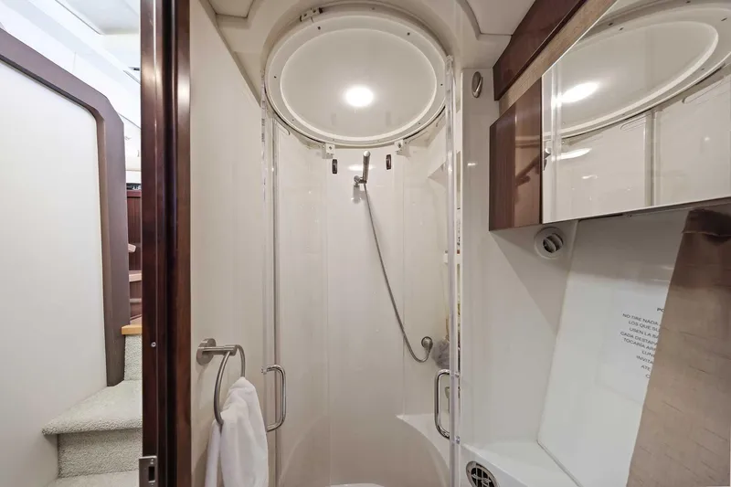 Slide: The Image of Luxurious bathroom in 2017 Sea Ray Sundancer 400 yacht, featuring modern shower and sleek design. - 25