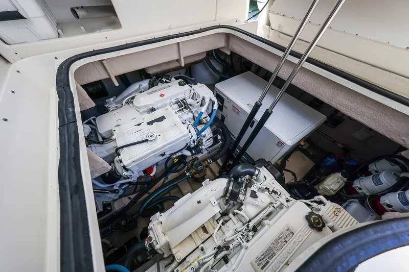 Slide: The Image of Engine compartment of a 2017 Sea Ray Sundancer 400 yacht, showcasing mechanical components. - 37