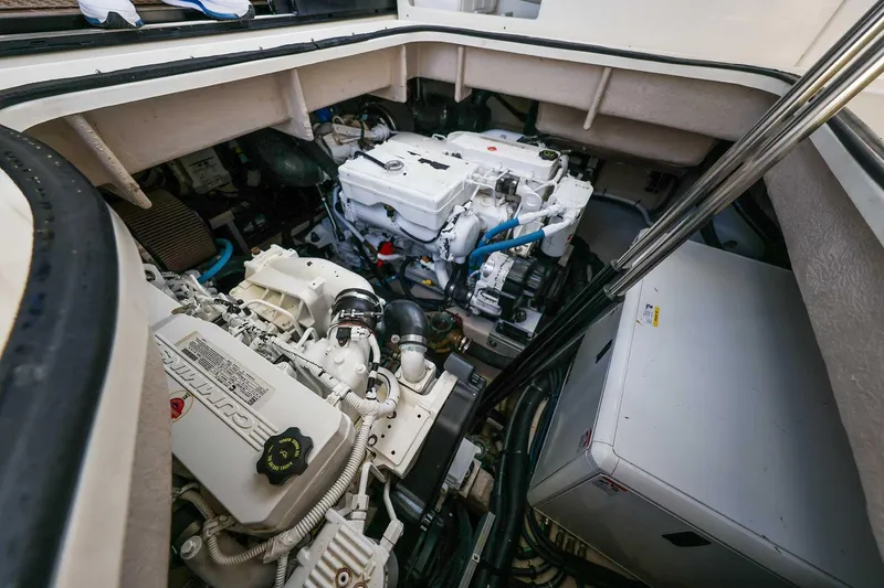Slide: The Image of Engine compartment of a 2017 Sea Ray Sundancer 400 yacht, showcasing mechanical components. - 39